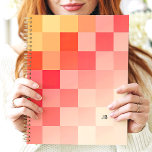 Bold Gradient Pink Chequerboard Monogram Planner<br><div class="desc">This vibrant design features a bold gradient chequerboard pattern in stunning shades of pink and peach. The customisable monogram adds a personal and modern touch, making it perfect for students, professionals, or anyone who loves trendy and artistic designs. Ideal for organising daily tasks, tracking goals, or jotting down creative ideas...</div>