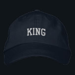 Bold KING Text Embroidered Adjustable Navy-Hat Hat<br><div class="desc">The Custom KING Text Printed Adjustable Cap is a stylish, go-to accessory for any casual look. Crafted from high-quality materials, this navy-coloured hat features bold, embroidered "KING" text, adding a touch of personality to your wardrobe. The adjustable strap ensures a perfect fit, making it comfortable for everyday wear while elevating...</div>