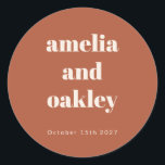 Bold Minimalist Boho Rust Retro Custom Wedding Classic Round Sticker<br><div class="desc">Add a personal touch to your wedding favours or stationery with these customisable terracotta stickers. Featuring your names and wedding date in a minimalist design, these stickers are perfect for sealing envelopes, decorating gift bags, or personalising party favours. The warm rust tone and clean typography make them an elegant addition...</div>