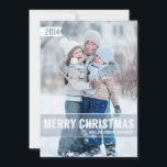 Bold Modern Merry Christmas Big Photo Card<br><div class="desc">A modern design of bold typography across the bottom of the card that wishes family and friends a big "Merry Christmas" on a slightly transparent wintery blue band at the bottom of the horizontal card to show off the white text. A white banner has cut-out 2014 year in the upper...</div>
