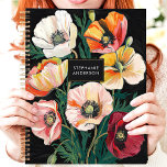Bold Painted Poppy Floral Custom Name Planner<br><div class="desc">This stunning design features a vibrant arrangement of painted poppy flowers in shades of red, orange, pink, and cream, set against a bold black background. The textured brushstrokes give it a hand-painted look, while the sleek nameplate adds a personalised touch. Perfect for professionals, students, or anyone who loves artistic floral...</div>