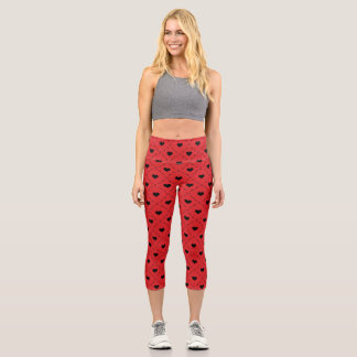 Bold Red Background with Small Black Hearts Capri Leggings