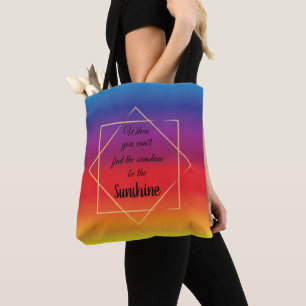 bold sunset background with "sunshine" quote tote bag