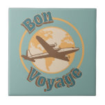 Bon Voyage Let's travel the world design Tile<br><div class="desc">Let's travel illustration with world map and aeroplane decoration on turquoise background and "Bon Voyage" text design for everybody who likes travelling. You can change the background colour easily. It is easy to customise it by changing the names/date/text etc.</div>