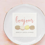 Bonjour French Macarons Bridal Shower Napkin<br><div class="desc">Bonjour! Add a touch of Parisian style to your bridal shower with these pretty cocktail napkins. Design features four delicious French macaron illustrations in pastel pink, ivory, tan and pale yellow, with "Bonjour" in peachy pink handwritten style script lettering. Customise with the guest of honour's name for a personalised touch....</div>