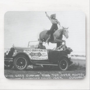 Bonnie Grey jumping her horse. Mouse Mat