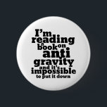 Book on Anti Gravity Funny Science Geek Puns 6 Cm Round Badge<br><div class="desc">I'm reading a book on anti gravity and it's impossible to put it down. Funny science pun design for those who love to study science. Cool and humorous quote merchandise for college students majoring in Physics. Perfect for scientist and physicist. Great Christmas gift and birthday present for family and friends....</div>