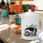 Books Cat Tea Cute<br><div class="desc">A cute black and white cat sleeping on a pile of books with a green teapot and a cup of tea.</div>
