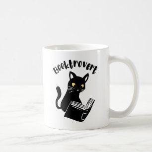 Booktrovert cat with book coffee mug