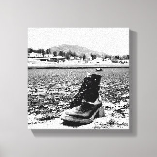 Boot on a dry lake bed. canvas print