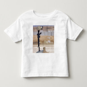 Boots, rifle, dog tags, and protective helmet toddler T-Shirt