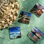 Bora Bora Coaster Set<br><div class="desc">Remember the different moments of your trip with this coaster set. Each individual image takes you back when you were willing to wake up early to catch the sunrise, lounge around sipping a cocktail while watching the sunset, or slowly walking back to your overwater bungalow to enjoy the last few...</div>