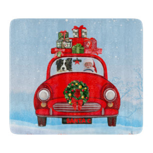 Border Collie Dog In Car With Santa Claus Cutting Board