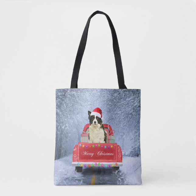 Border Collie Dog in Snow sitting in Christmas  Tote Bag (Front)