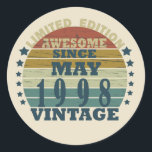 Born in 1998 birthday gift classic round sticker<br><div class="desc">You can add some originality to your wardrobe with this original 1998 vintage sunset retro-looking birthday design with awesome colours and typography font lettering, is a great gift idea for men, women, husband, wife girlfriend, and a boyfriend who will love this one-of-a-kind artwork. The best amazing and funny holiday present...</div>