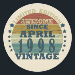 Born in april 1998 vintage birthday classic round sticker<br><div class="desc">You can add some originality to your wardrobe collection with this vintage retro sunset graphic design with awesome typography font lettering, a great gift for men, women, husbands, wives, girlfriend, and a boyfriend who will love this one-of-a-kind artwork. The best and most fun holiday present for your happy birthday party....</div>