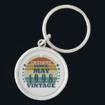 Born in may 1998 vintage birthday key ring<br><div class="desc">You can add some originality to your wardrobe collection with this vintage retro graphic design with awesome typography font lettering, a great gift for men, women, husbands, wives, girlfriend, and a boyfriend who will love this one-of-a-kind artwork. The best and most fun holiday present for your happy birthday party. If...</div>