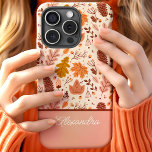 Botanical Fall Floral Leaves Script Name iPhone 15 Case<br><div class="desc">Embrace the beauty of autumn with this charming design featuring a pattern of botanical fall leaves and florals. The warm tones of orange, brown, and beige create a cosy and seasonal look, perfect for fall enthusiasts. The script name element adds a personalised and elegant touch, making this design both stylish...</div>