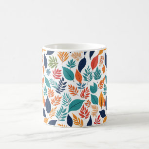 Botanical pattern with tropical leaves on white coffee mug