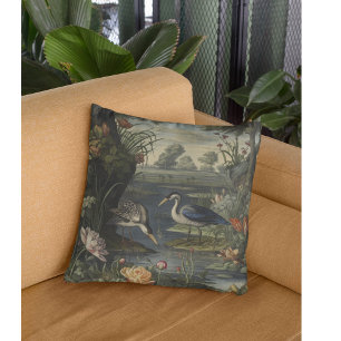 Botanical scene of blue cranes by a river cushion