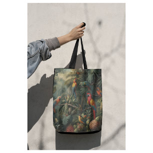 Botanical scene of parrots and pineapples tote bag