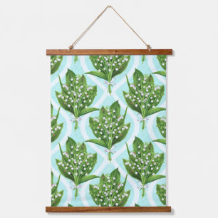 Bouquet of lilly of the valley flowers on blue hanging tapestry