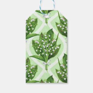 Bouquet of lilly of the valley flowers on green gift tags