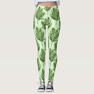 Bouquet of lilly of the valley flowers on green leggings