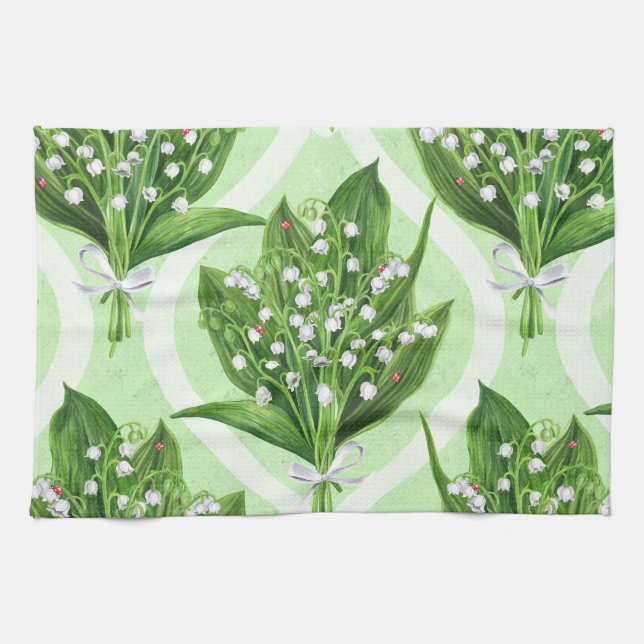 Bouquet of lilly of the valley flowers on green tea towel (Horizontal)