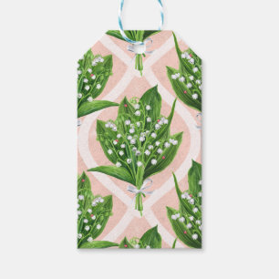 Bouquet of lilly of the valley flowers on pink gift tags