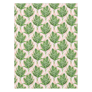 Bouquet of lilly of the valley flowers on pink tablecloth