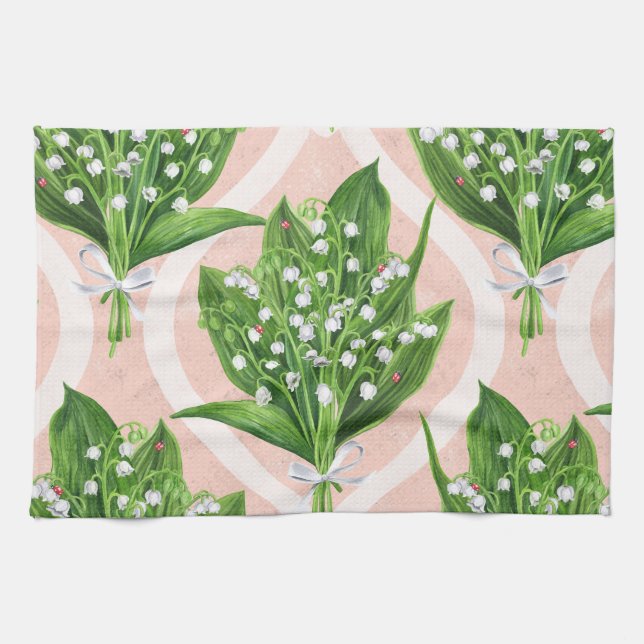 Bouquet of lilly of the valley flowers on pink tea towel (Horizontal)