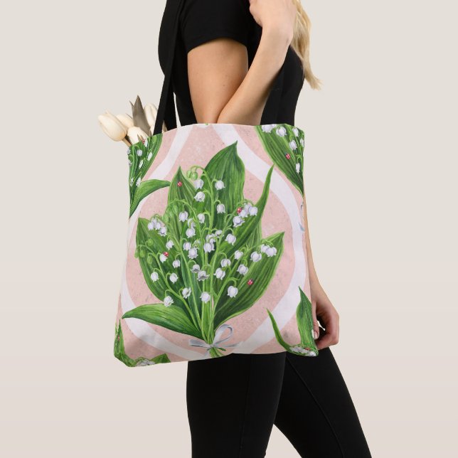 Bouquet of lilly of the valley flowers on pink tote bag (Close Up)
