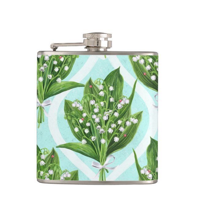 Bouquet of lily of the valley flowers on blue hip flask (Front)