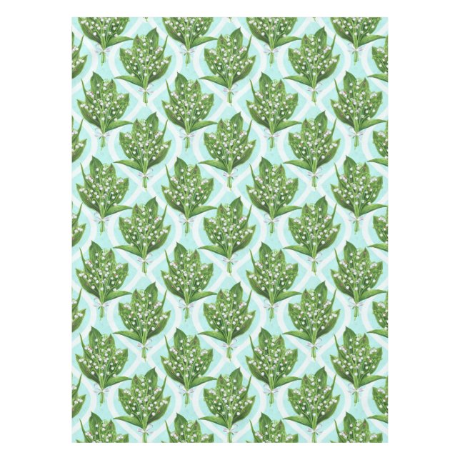 Bouquet of lily of the valley flowers on blue tablecloth (Front)