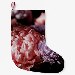 Bouquet of pink with purple aster flowers in light small christmas stocking