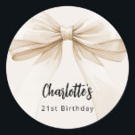 Bow beige cream birthday classic round sticker<br><div class="desc">A beige,  cream coloured background. Decorated with a large bow.  Personalise and add a name and age. Black handwritten style script.</div>