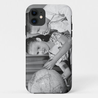 Boy and Girl Viewing Globe iPhone 11 Case