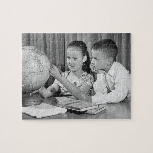 Boy and Girl Viewing Globe Jigsaw Puzzle