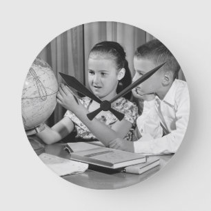 Boy and Girl Viewing Globe Round Clock
