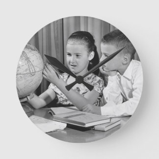 Boy and Girl Viewing Globe Round Clock