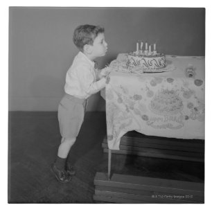 Boy Blowing Out Candles Tile