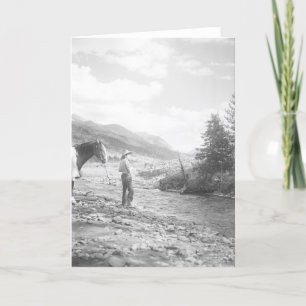 Boy fly fishing. card