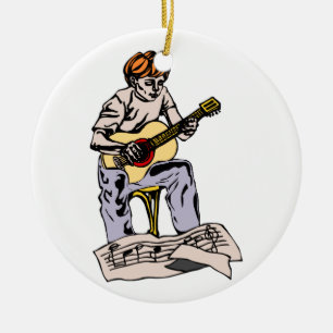 Boy playing acoustic guitar with sheet music ceramic tree decoration