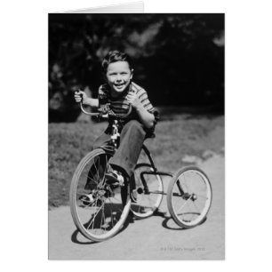 Boy Riding Tricycle