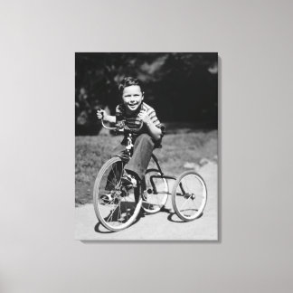 Boy Riding Tricycle Canvas Print