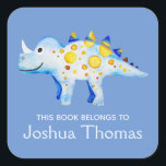 Boys Blue This Book Belongs Dinosaur and Name Kids Square Sticker<br><div class="desc">This beautiful boy's 'this book belongs' bookplate design features a watercolor blue and gold dinosaur,  and has place for you to add your kids name in lovely typography. Perfect for your child's back to school supplies. Check out the rest of our collection for other cute kids items.</div>