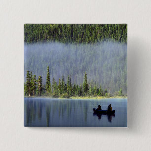 Boys fishing from canoe with mist in 15 cm square badge
