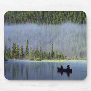 Boys fishing from canoe with mist in mouse mat