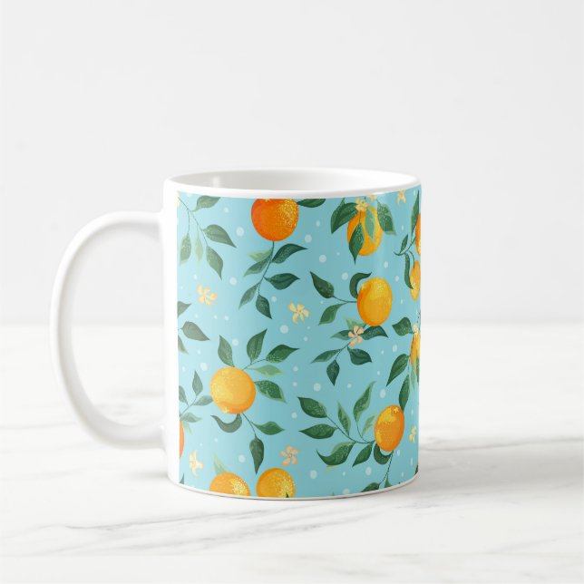 Branches of oranges with flowers on a blue backgro coffee mug (Left)